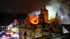 Russian strikes kill nine and set historic cathedral in Kyiv ablaze