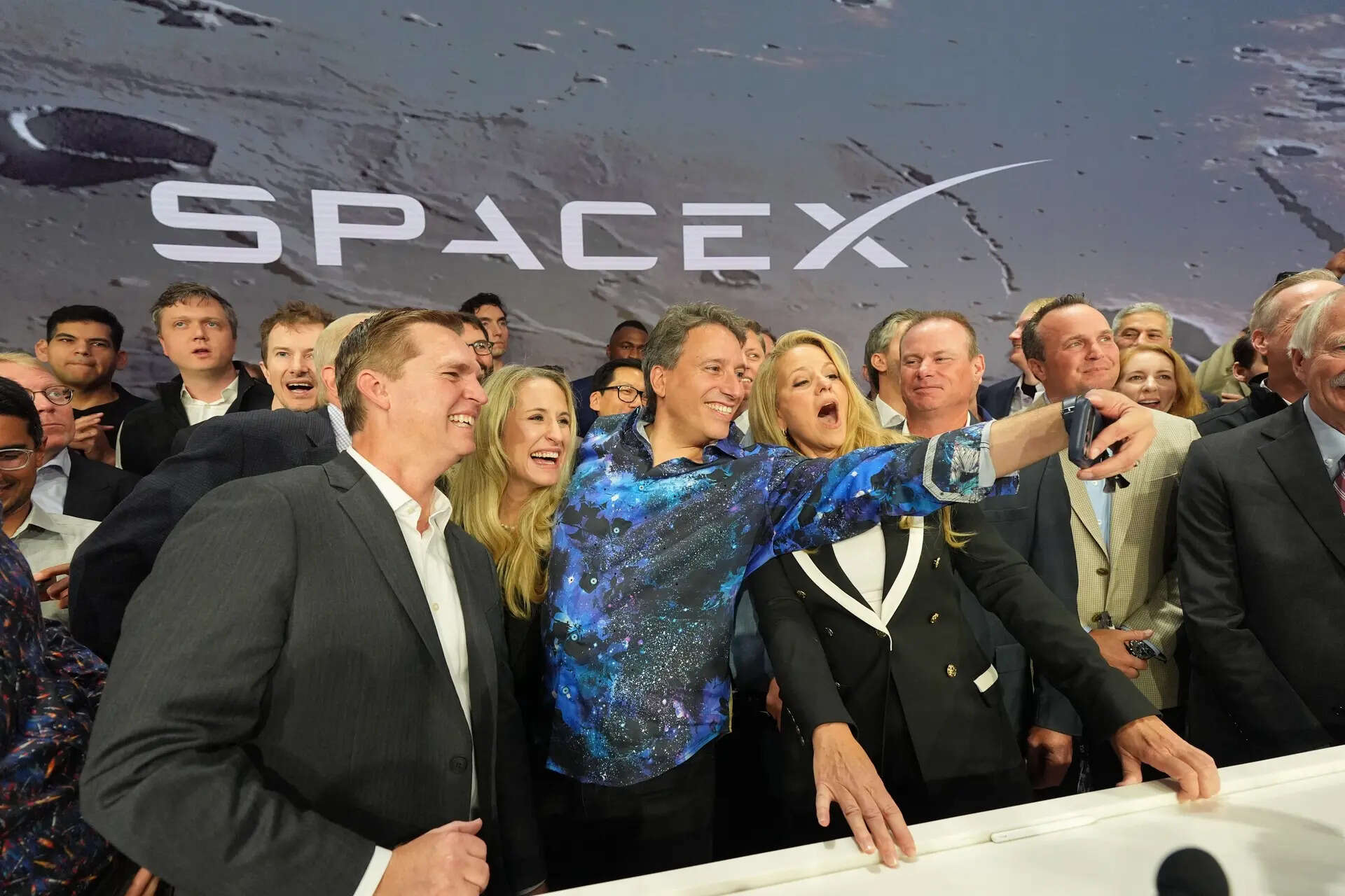 SpaceX shares rise 11% in strong Nasdaq debut after $75 billion IPO