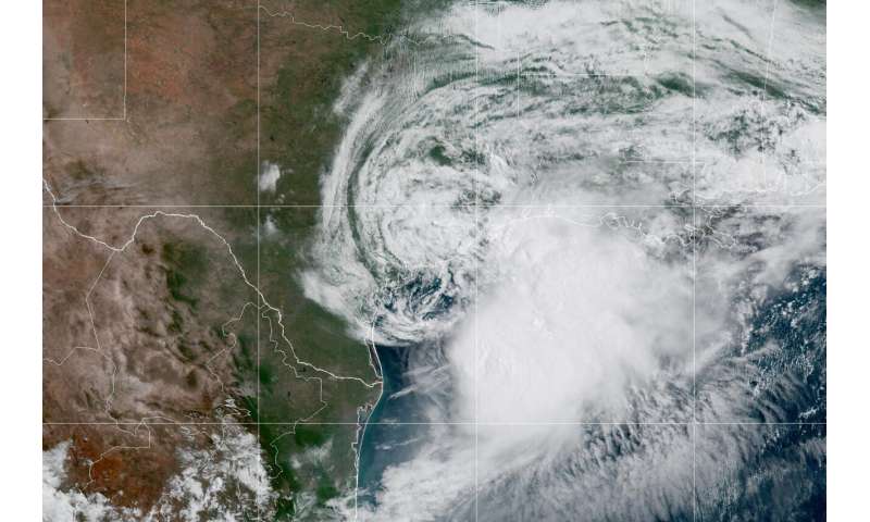 Tropical Cyclone Arthur weakens to a low pressure area along the upper Texas coast